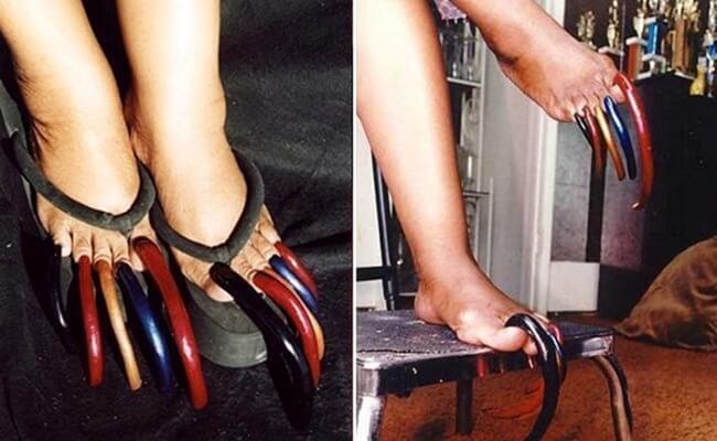 Луиз Холис носи най-дългите нокти на краката